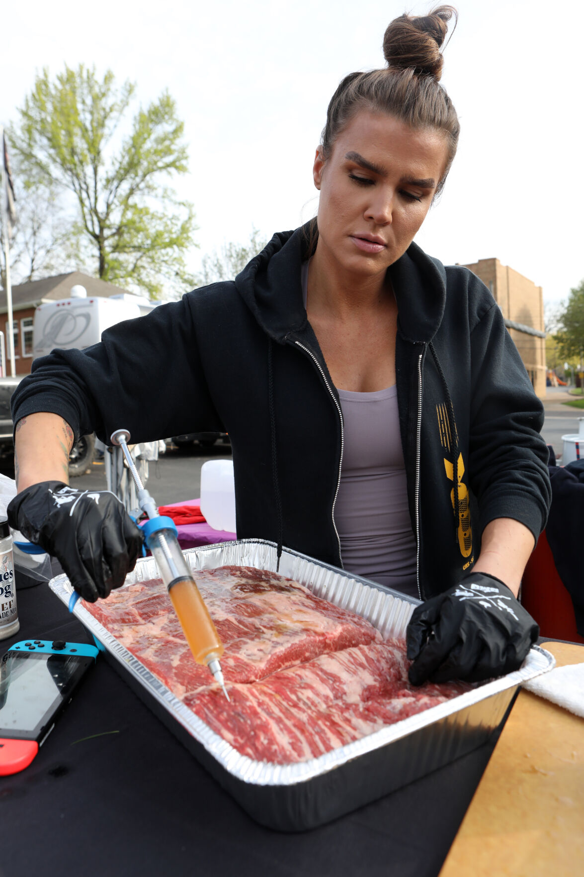 Christina Fitzgerald injects brisket